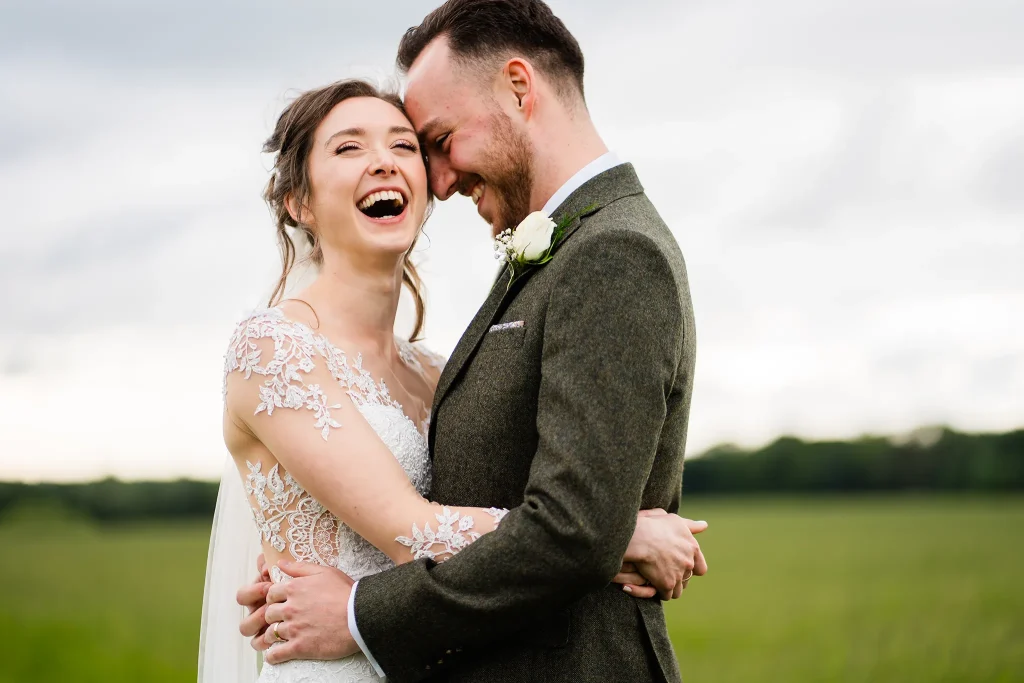 Bride laughing at Beeston Manor
